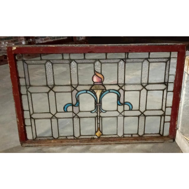 C. 1905 Beaux Arts style leaded polychrome stained and textured glass window panel having geometric patterned centered...