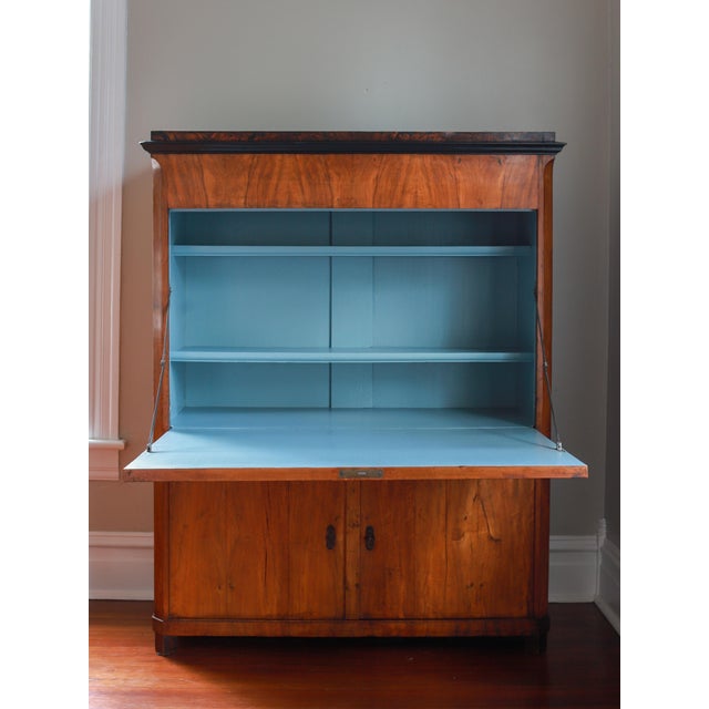 Work from home, but make it chic. We love a good secretary desk, and this one is about as handsome of an example, as we’ve...