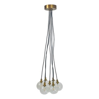 Modern 7-Light Cluster Chandelier With Oversized Glass Globes and Satin Brass Ca For Sale