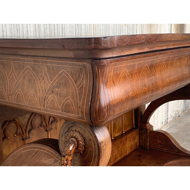 Absolute unique walnut wall console table artfully made in the early Biedermeier period circa 1830 in Austria. Made with...