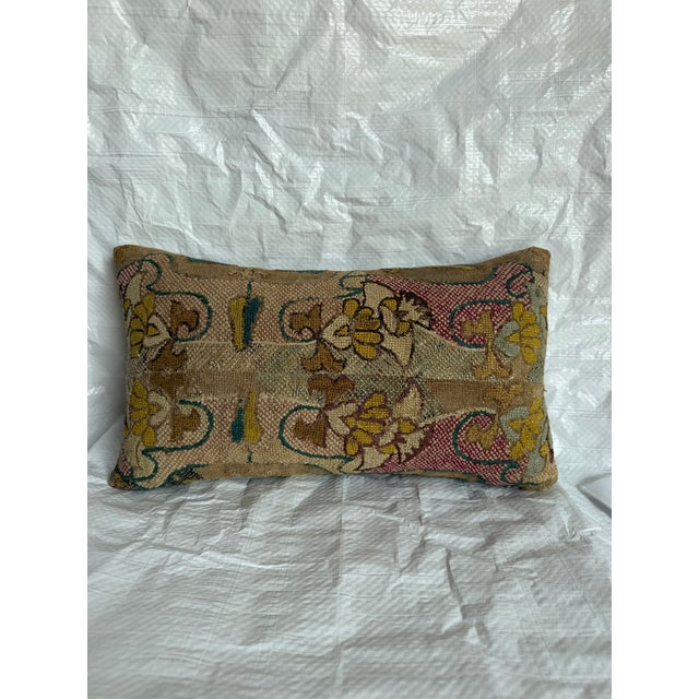 This antique pillow is created from a 17th-century Italian Florentine tapestry textile, preserving a fragment of the...