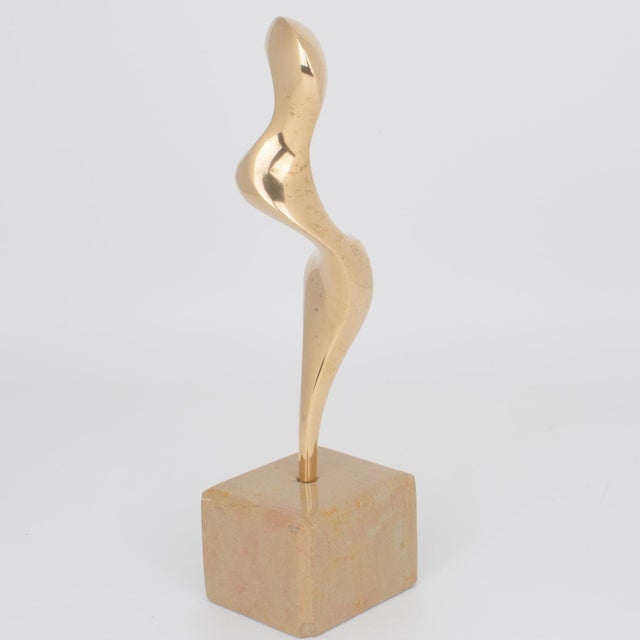Discover a striking work of art by acclaimed French sculptor Roland Masson: a rare, limited-edition abstract bronze...