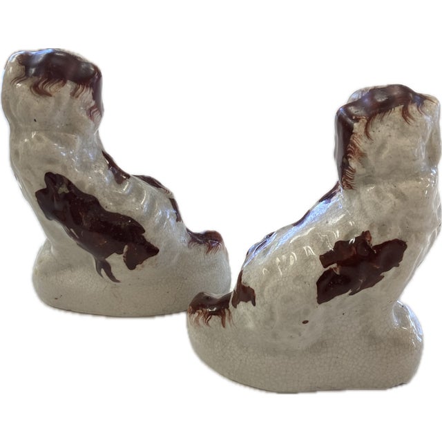 This pair of Staffordshire Terriers won't need feeding, walks, or your entire sofa. Small enough to fit on a bookshelf,...