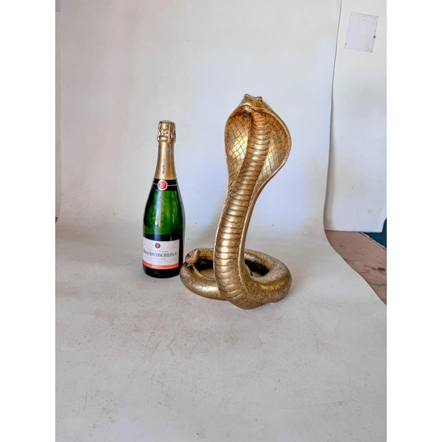 Snake Resin Gilt Sculpture, a cobra stand up, France 20th Century.
