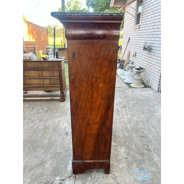 This elegant French 19th-century Louis Philippe secrétaire is beautifully crafted in richly figured burl walnut and...