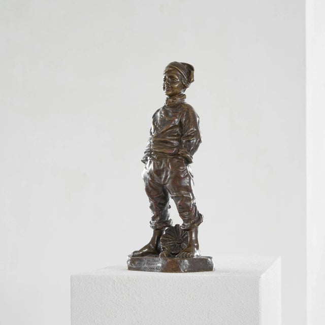 Josép Cardona i Furró Bronze Sculpture of a Boy. Spain, late 19th century / early 20th century. This is a bronze sculpture...