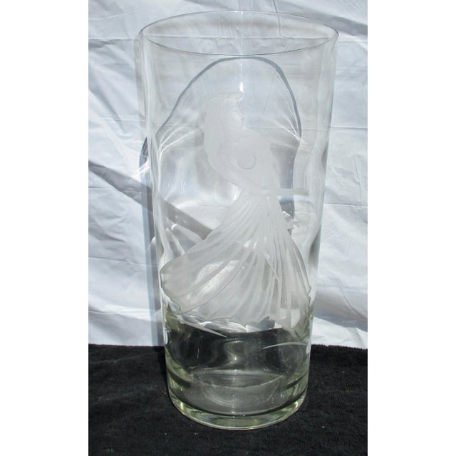 Thick walled glass vase with dancer pattern cut design to front. Smooth walls outside , rolling thickness on inside ,...