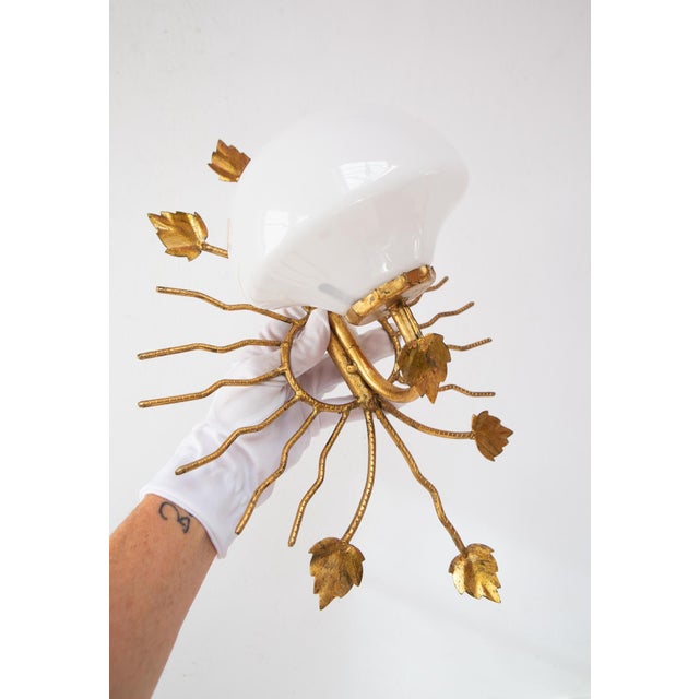 It uses a small screw-in E14 bulb. Due to the design of the wall light, the bulb must be especially small, like the one in...