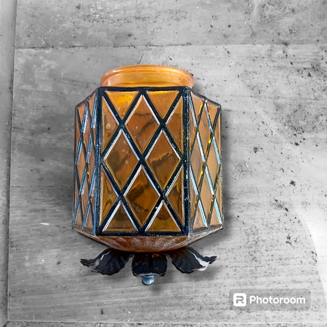 Rare Amber Glass outdoor light fixture shade from the 1930s. Beautiful hand crafted glass in a deep amber shade, with...