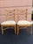 A matched pair of Lexington Tommy Bahama Beach House dining chairs featuring faux bamboo frames, open fretwork backs, and...