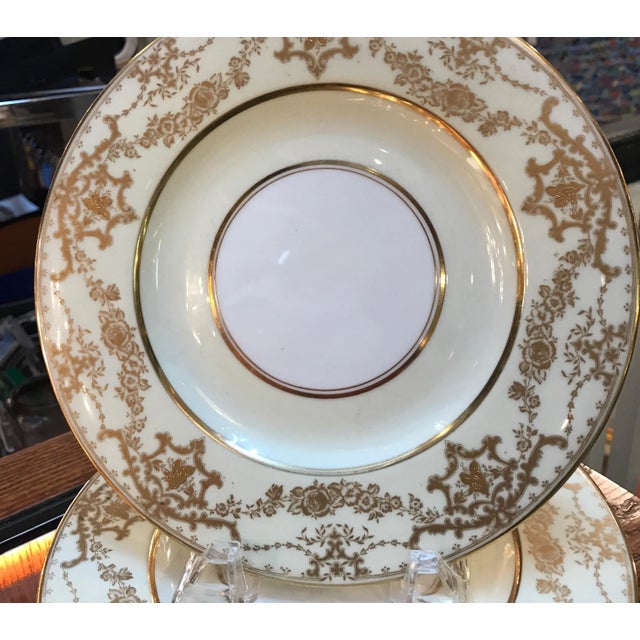 Elegant set of 10 gilt bordered luncheon dessert plates by George Jones, England. Elegant borders with a vanilla...