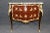 This is an outstanding rosewood and king wood commode of the finest possible quality. The bronzes are decadent and...