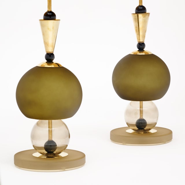 Pair of table lamps made of hand-blown glass elements from Murano; Italy outside of Venice. Each lamp features unique...