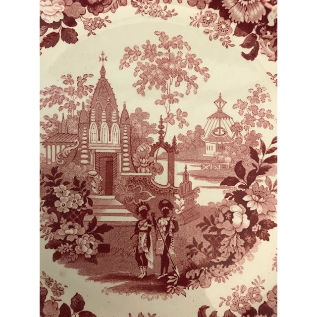 This plate was made by the Staffordshire pottery firm William Adams & Son in the 1820's. The pattern is known as Temple...