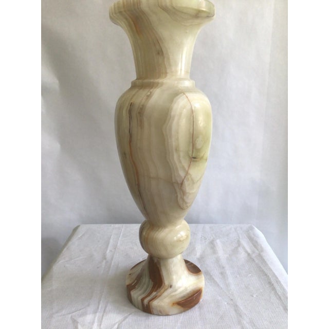 1960s Carved Onyx Urn Vase This elegant large vase is composed of layers of cream and earthy green onyx banding. With...