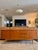 A classic mid century modern sideboard by Morris of Glasgow, made in Scotland, circa 1960s. Features three pullout...