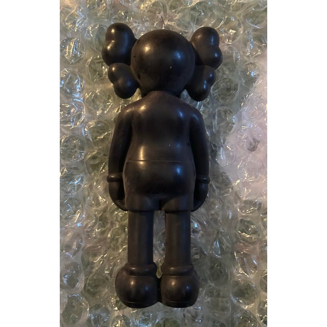 This KAWS Companion Candle in black was made in Tokyo by Original Fake. The candle is in excellent condition and comes in...