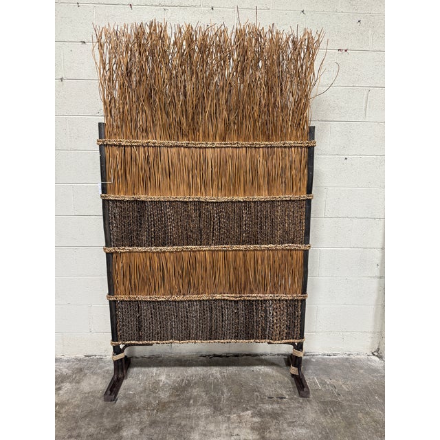 So unique! Great for a condo patio balcony when you need a little privacy! Solid and easy to move. No maker name.