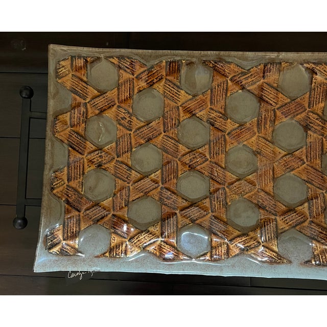 A brand new showroom display Carolyn Kinder International tray. Never used. No imperfections.