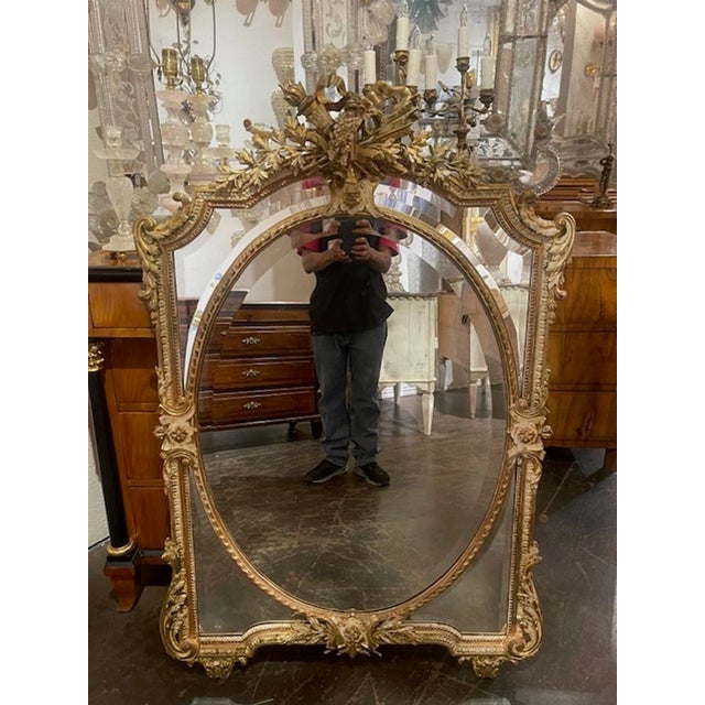 This 19th c. French Louis XV Giltwood Mirror is a luxurious and elegant addition to any room in your home. With its...