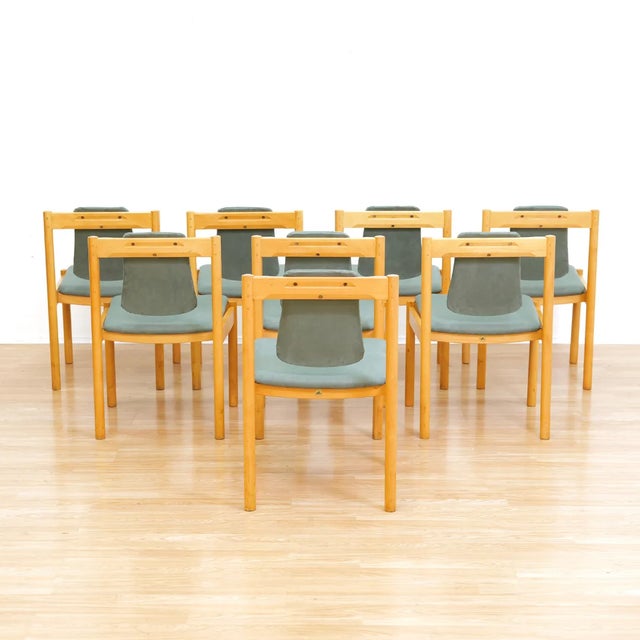 This vintage set of eight dining chairs were made by British furniture icon Ercol. These are a rare set from the 1980s by...
