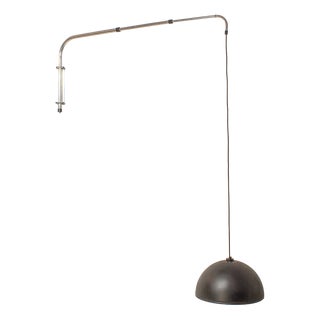 Adjustable Wall Lamp in the style of the Castiglioni Brothers For Sale