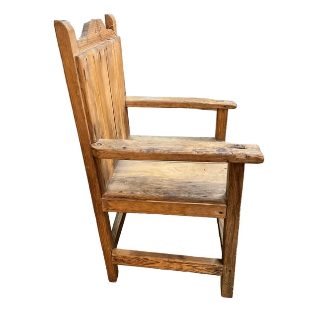 A very old Hand Hewn Texas Chair, from a Hill County Texas Ranch, put together with pegs. It needs to be tightened but is...