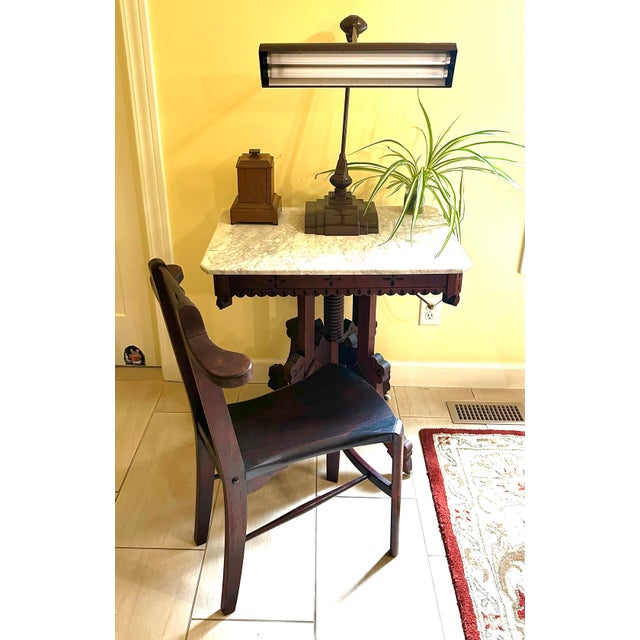 This mid 20th century, brown, Flexo brand light, is an adjustable, drafting lamp, that was made by the Art Specialty Co.,...