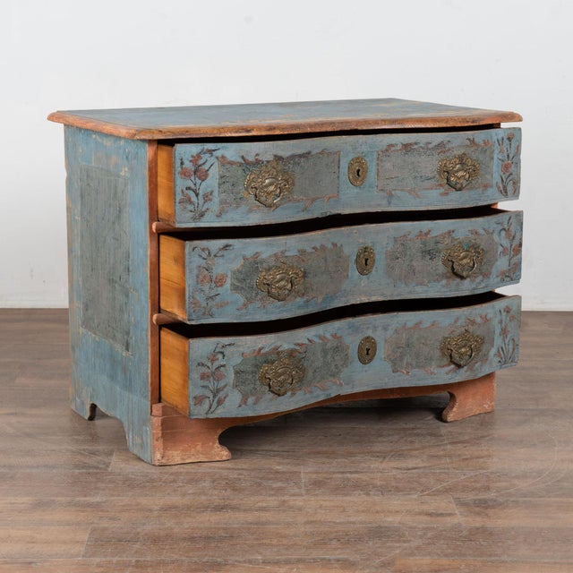 Late 18th century Danish chest of three drawers crafted in pine. The chest retains its original blue painted finish with...