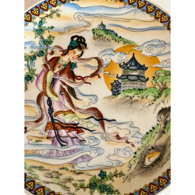 Lovely Vintage Chinese porcelain plate depicting Chang'e, the Chinese moon goddess. Origin: Likely from Jingdezhen, known...