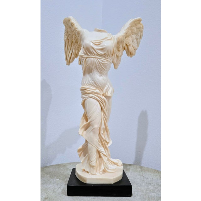 Elegant vintage A. Santini “Winged Victory of Samothrace” classic figure sculpture, measuring approximately 15 inches tall...