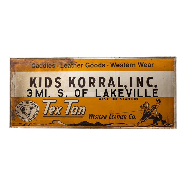 Vintage Painted Tin Tex Tan Western Wear Sign For Sale