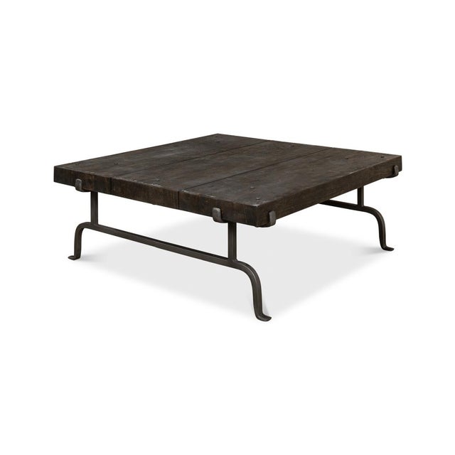 The thick wooden top, finished in a deep brown stain, showcases the natural grain and texture of the acacia wood, adding...