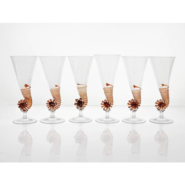 We present to you this rare and exceptional set of antique Murano glass flutes, inspired by the nautilus shell. These...