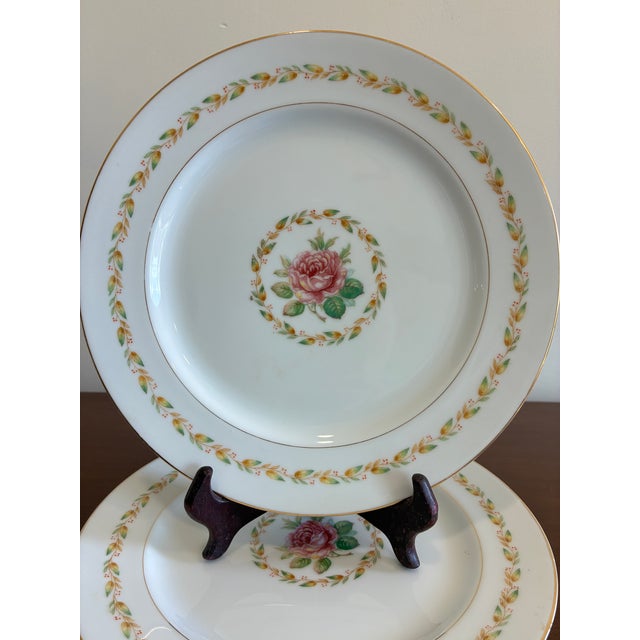 Timeless and refined, this set of four Mikado Laurel pattern plates showcases a soft pink rose motif encircled by a green...