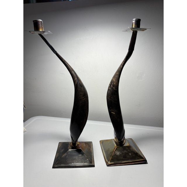 Here we have an extraordinary pair of candlesticks that combine earthy-ness and elegance in a stunning result. A pair of...