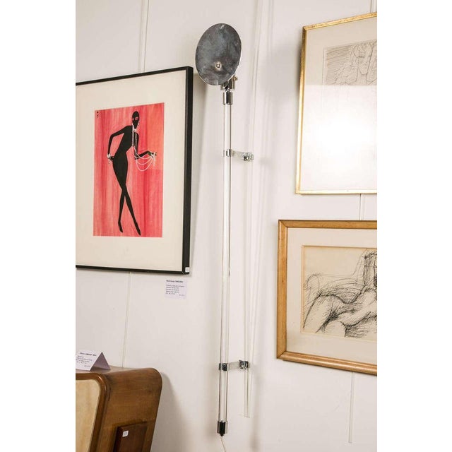 A pair of sconces created by peter hamburger (b. 1941) for knoll. An acrylic resin rod is masking the wire and making it...