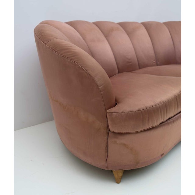 Gio Ponti three-seater sofa for "Casa e Giardino", 1936. Curved shell model covered in original vintage satin, the...