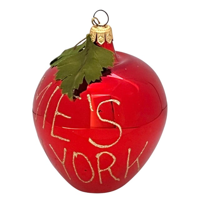 Add this vintage Bloomingdale’s big apple Christmas glass ornament to your holiday decor. Signed “Bloomie’s New York”. In...