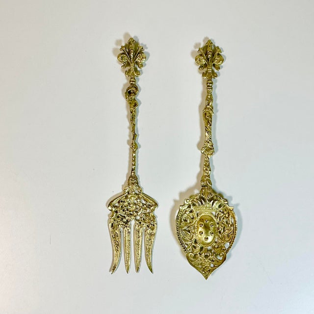 Vintage Home is please to present this set of Fork and Spoon Serving Utilities. These are Italian in the highly ornate...