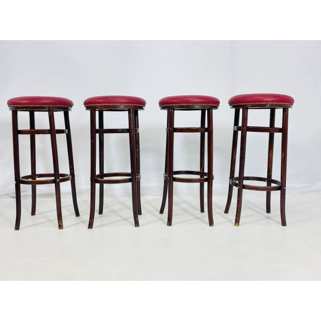 Vintage set of four barstools designed and manufactured by Michael Thonet for Thonet Furniture. The stools are made our of...