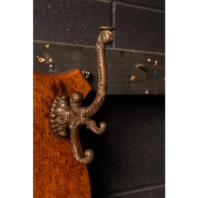 Victorian Oak Shield Wall Rack With Figural Cast-Iron Hooks For Sale - Image 4 of 5