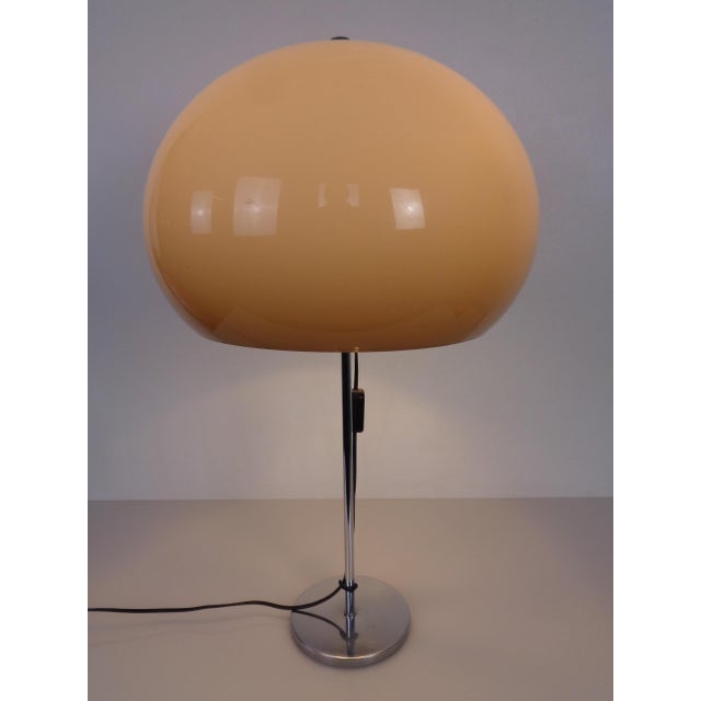 Table lamp with a lampshade made of light brown plastic and a chrome-plated stand from the 1960s. European Plug (up to...