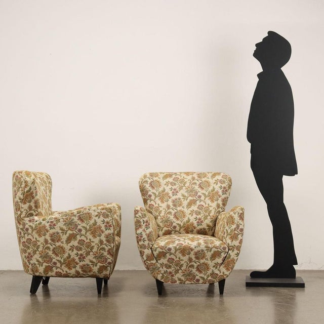 Armchairs with sprung padding and Jacquard fabric covering, original from the period, wooden legs. This piece is...