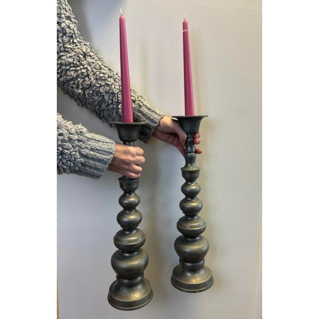 Pair of Metal Pewter-colored Candlesticks weight in at 3.3lbs each and reach to 18" tall. The vintage set is four pieces,...