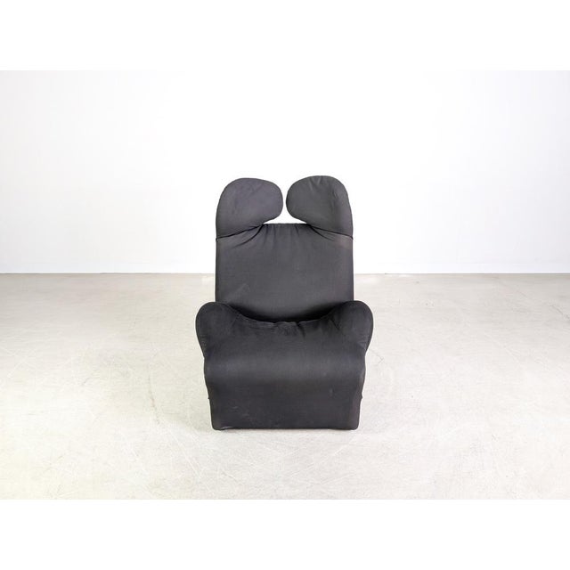 We are offering a beautiful Cassina Wink Chair in black fabric for sale. This chair is considered a true design classic...
