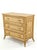 This vintage three-drawer chest features natural bamboo pole frame construction paired with tightly woven cane paneling....