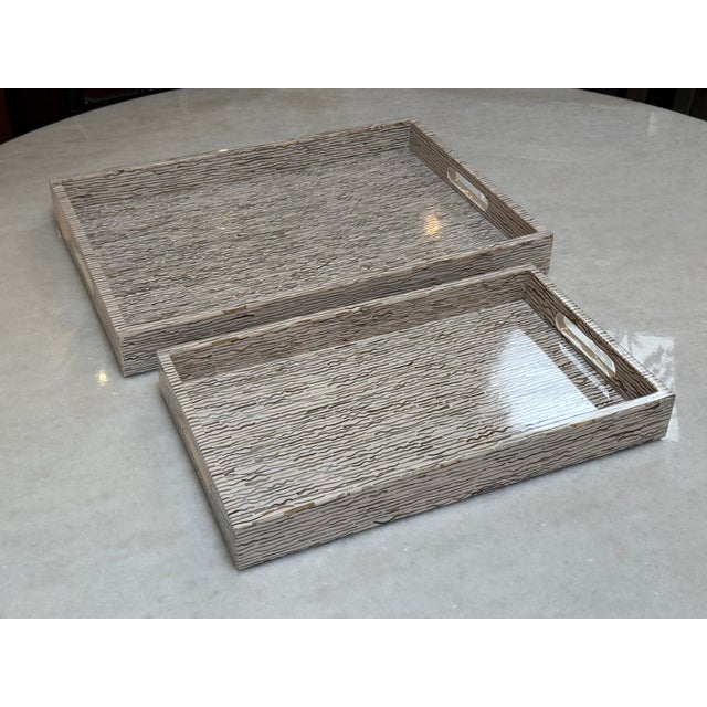 Design Plus Gallery presents the Averelia Tray Set from Made Goods. This coordinating set of two rectangular nesting trays...