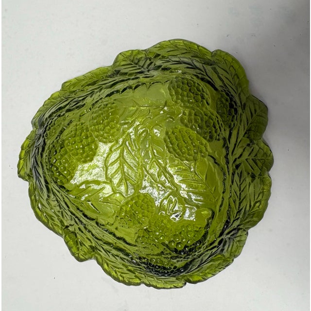 Vintage Indiana Glass Harvest Grape bowl crafted in richly colored olive green pressed glass, dating to the late...