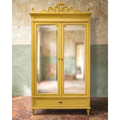Discover an elegant 19th c french louis xvi style armoire that looks as though it has just returned from a very successful...
